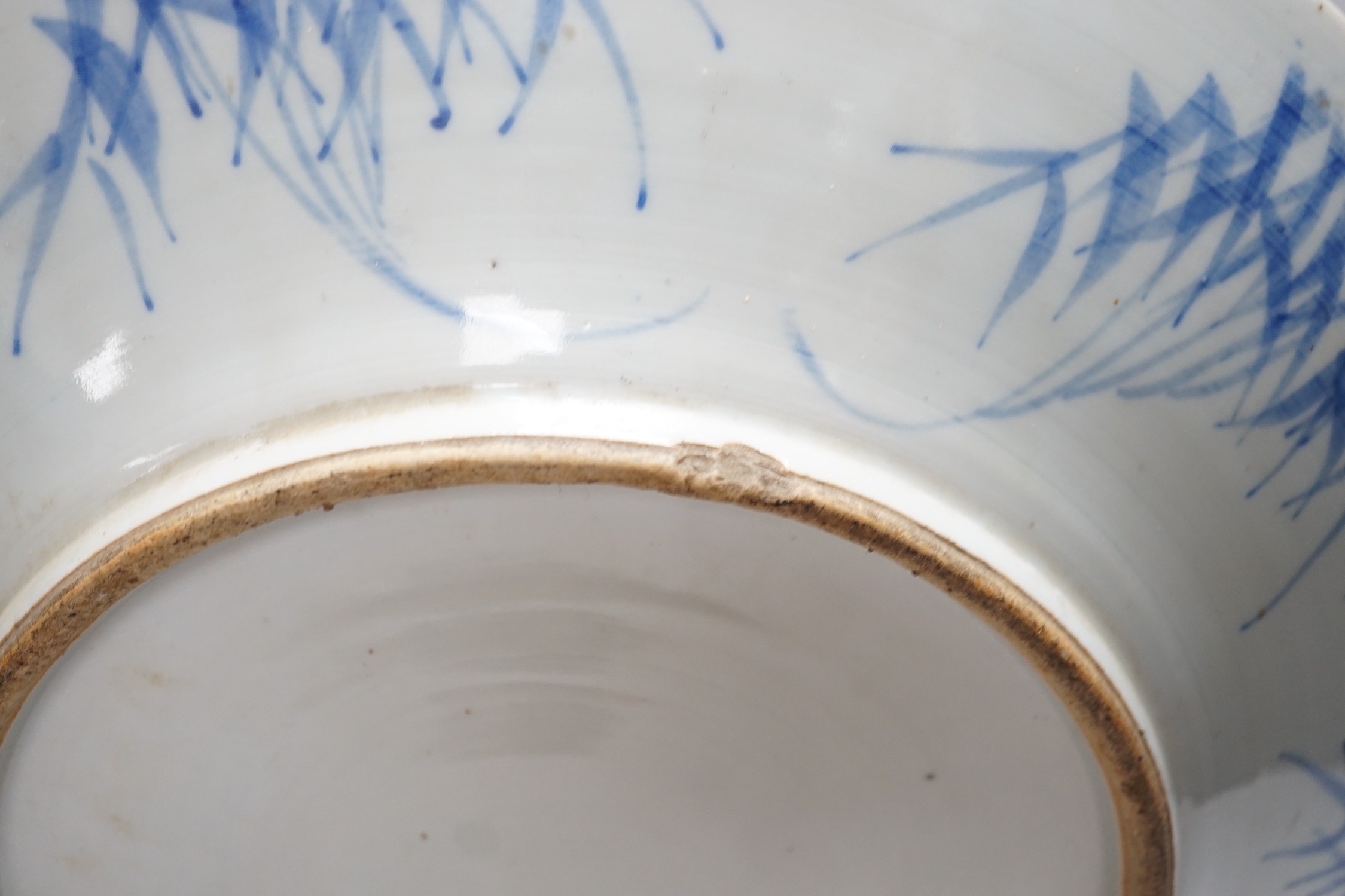 A Chinese blue and white ‘Hundred Antiques’ dish, late 19th century, 38cms diameter